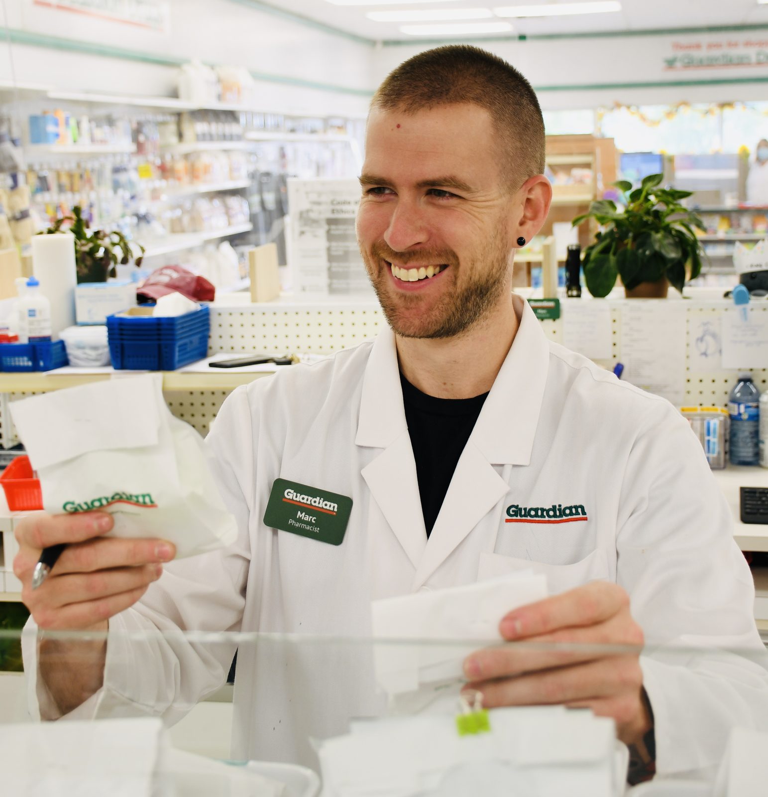 Marc, pharmacist, preparing a prescription at Ryan's Pharmacy